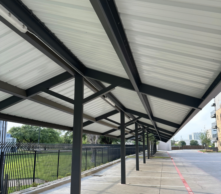 Long-span metal carport at a multi-family residential complex
