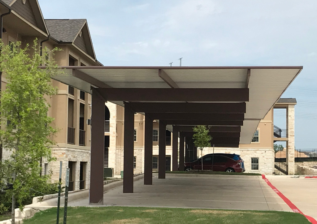 Commercial steel carport with gabled roof
