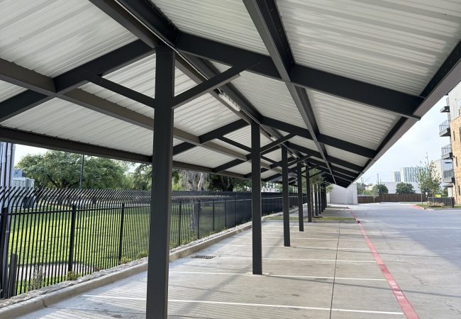 Covered parking with high-wind-rated metal roofing